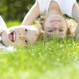 Image of two children playing outside