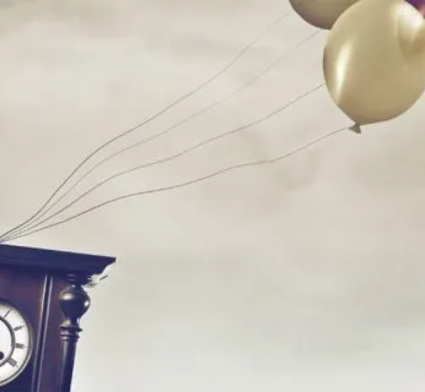 Image of clock and balloons