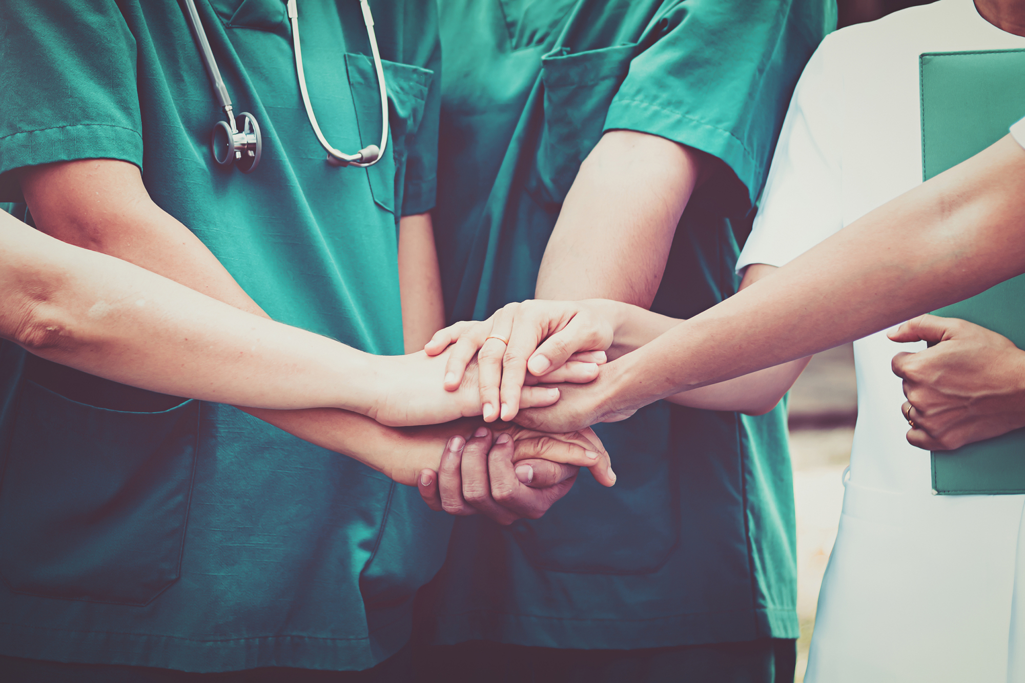 medics touching hands