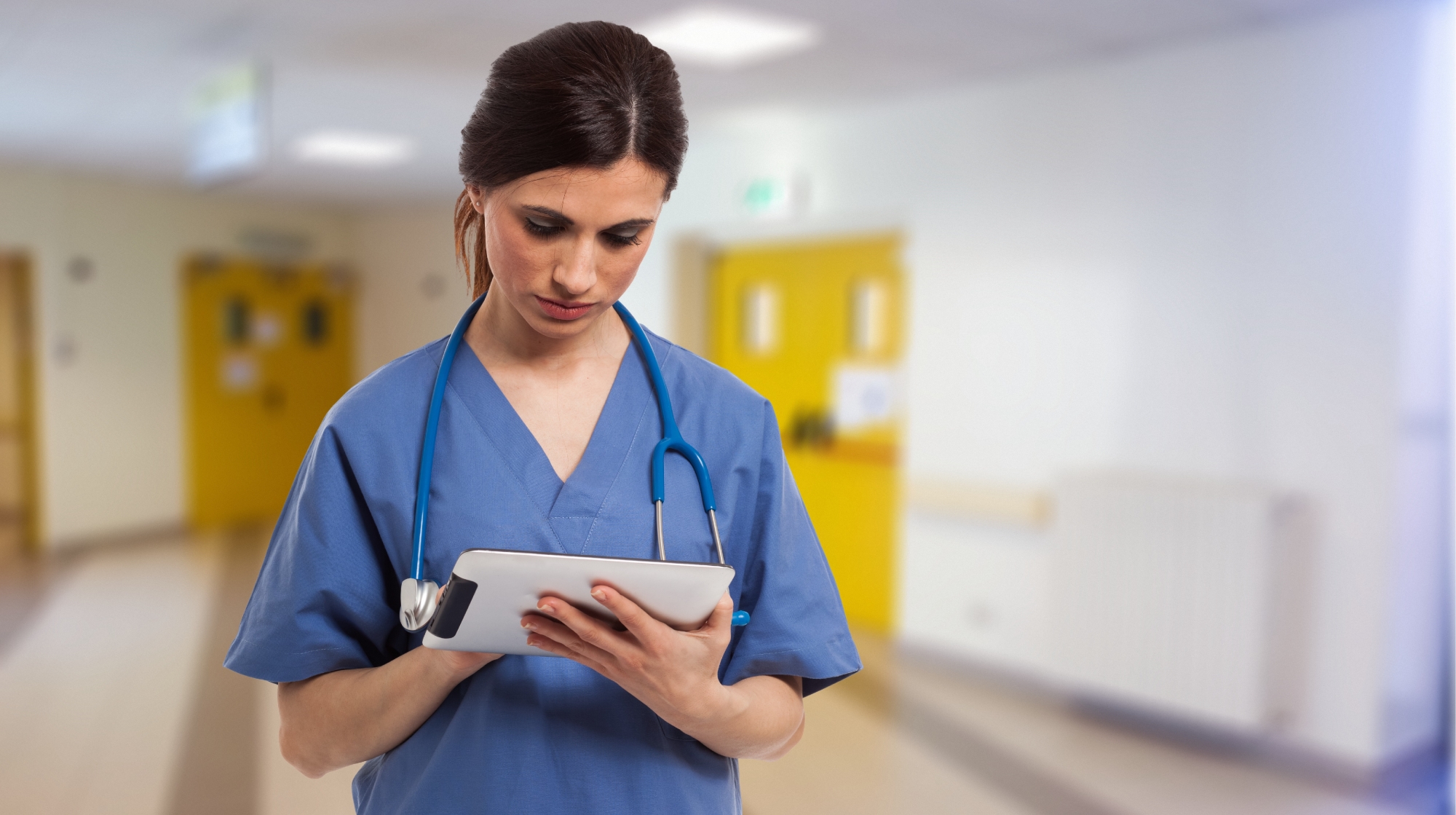 image of nurse with tablet