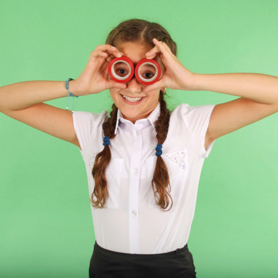 Image of girl holding hoops in front of her eyes
