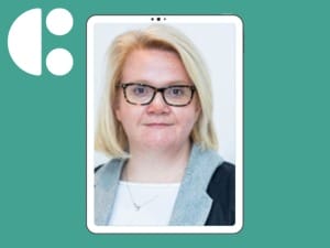A picture of Julie O'Connor taking up the new senior management role at System C.