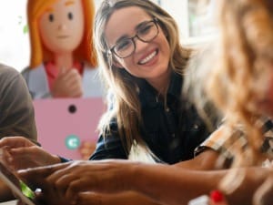 A picture of a social worker using an electronic device.