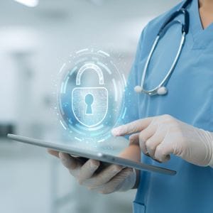 A healthcare worker using our CareFlow EPR (electronic patient record) system on an iPad.