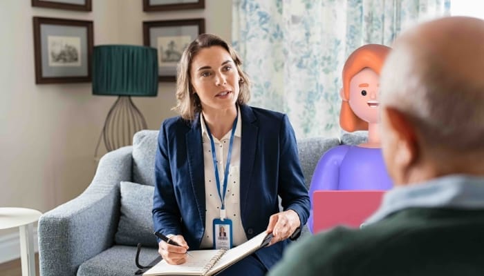 A female social worker speaking to an adult next to a System C local government character.