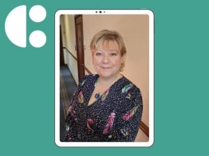 a picture of Jacqueline Davis with a System C background.