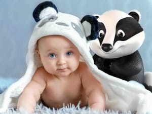 A picture of the BadgerNet Badger with a new-born baby.