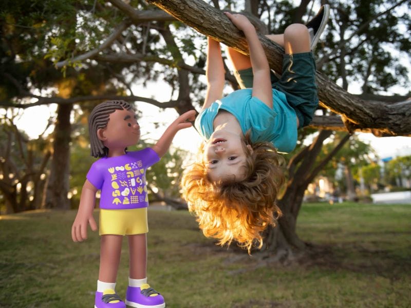 A picture of 2 children playing outside.