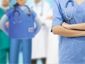 A picture of healthcare staff stood with a System C character.