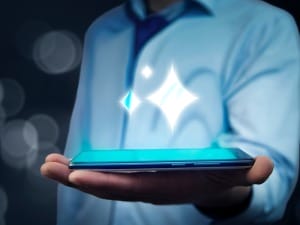 A picture of a social worker using the System C AI solution on an electronic device.