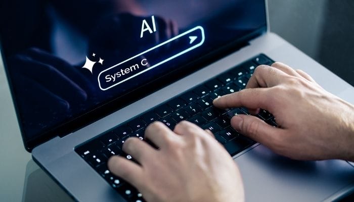A customer accessing System C AI Solutions on a laptop device.