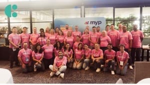 A picture of the MYP Technologies team with a System C logo in the corner.