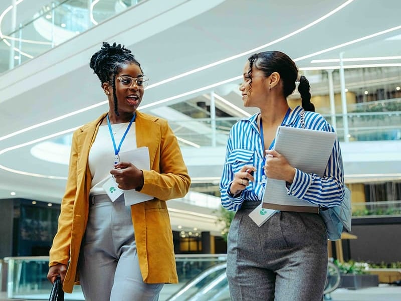 Two System C staff in an office