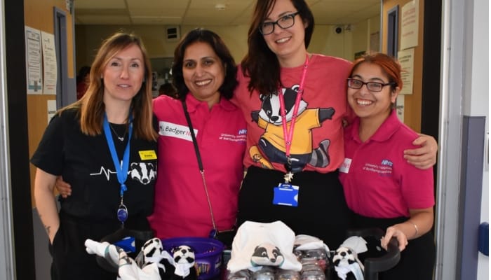 A picture of BadgerNet customers smiling.