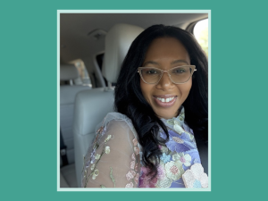 A picture of Shereen Bryan, smiling at the camera.