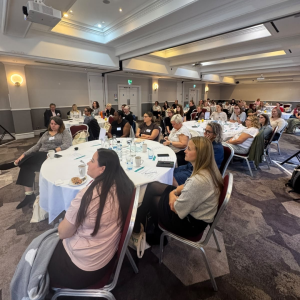 A picture of a busy room at the Digital Midwives Roundtable Event.